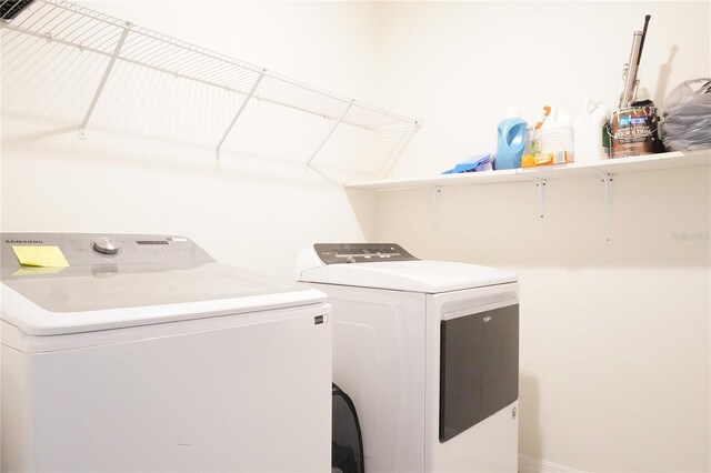 9016 Pyrus St, Kissimmee, FL 34747 - washroom featuring independent washer and dryer