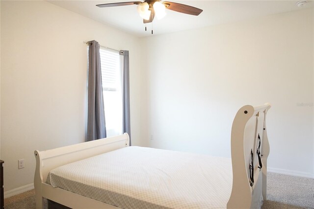 9016 Pyrus St, Kissimmee, FL 34747 - bedroom featuring carpet floors, baseboards, and ceiling fan
