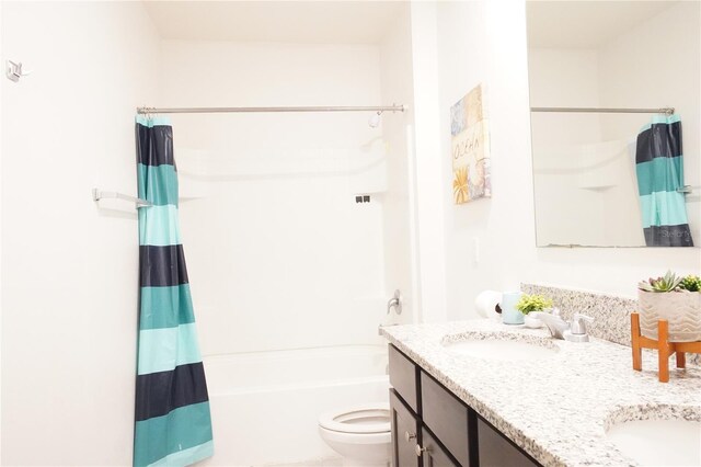 9016 Pyrus St, Kissimmee, FL 34747 - full bath featuring shower / bath combo, double vanity, and toilet
