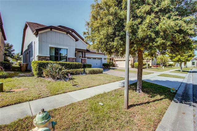 5118 Tiber Way, Saint Cloud, FL 34771 - view of front of property featuring concrete driveway, a front lawn, and an attached garage