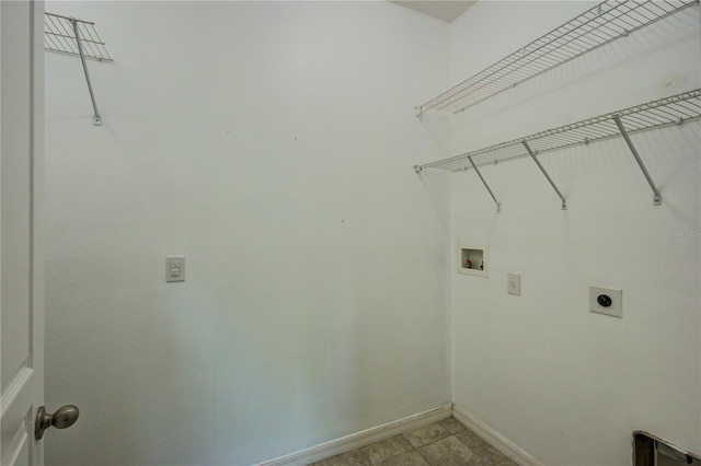 5118 Tiber Way, Saint Cloud, FL 34771 - laundry area featuring baseboards, laundry area, washer hookup, and hookup for an electric dryer
