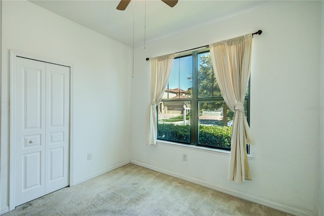5118 Tiber Way, Saint Cloud, FL 34771 - unfurnished bedroom featuring carpet flooring, baseboards, and ceiling fan