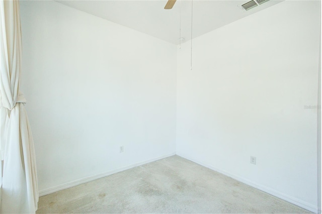 5118 Tiber Way, Saint Cloud, FL 34771 - spare room featuring ceiling fan, light carpet, visible vents, and baseboards