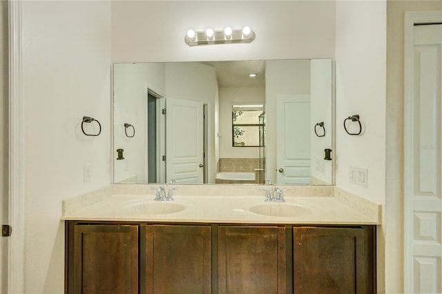 5118 Tiber Way, Saint Cloud, FL 34771 - full bath with a tub to relax in, a sink, and double vanity