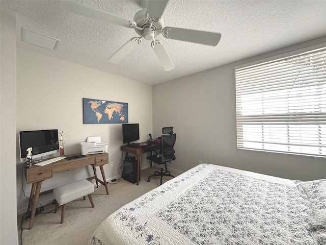 9435 Myrtle Creek Ln Unit 304, Orlando, FL 32832 - bedroom featuring a ceiling fan, a textured ceiling, carpet, baseboards, and visible vents