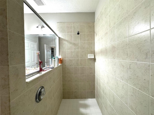 9435 Myrtle Creek Ln Unit 304, Orlando, FL 32832 - full bathroom featuring visible vents and tiled shower