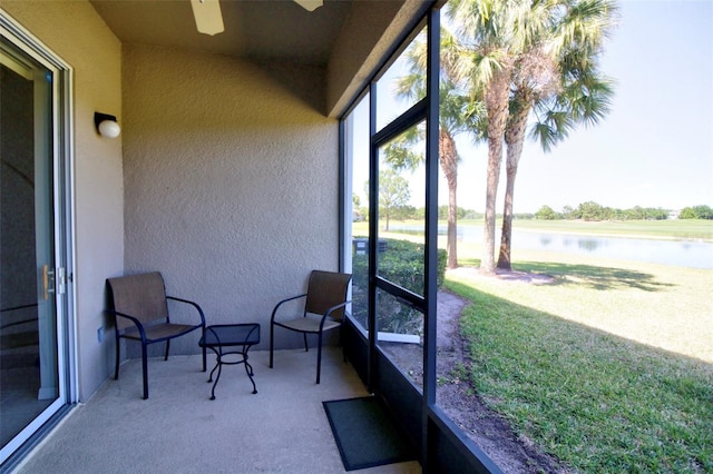 9435 Myrtle Creek Ln Unit 304, Orlando, FL 32832 - sunroom featuring a water view and ceiling fan