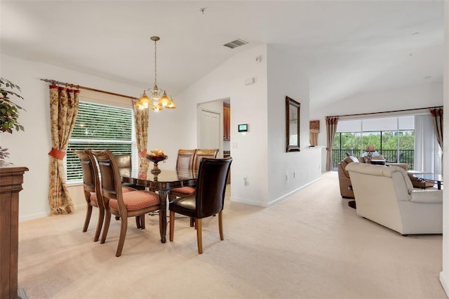 8374 Quimby Cir Unit 8374, Davenport, FL 33896 - dining area with lofted ceiling, a chandelier, light colored carpet, baseboards, and healthy amount of natural light