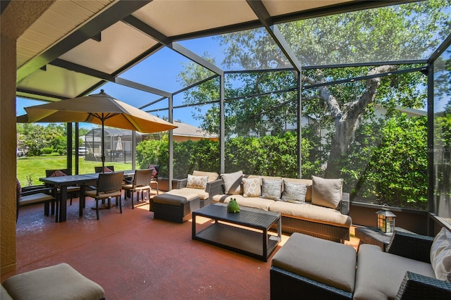 523 Shell Creek St, Poinciana, FL 34759 - view of patio featuring outdoor dining area, an outdoor living space, and glass enclosure