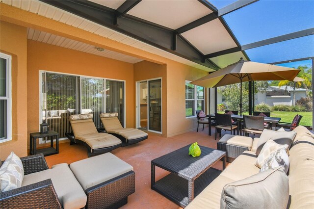 523 Shell Creek St, Poinciana, FL 34759 - view of patio featuring outdoor lounge area, outdoor dining space, and a lanai