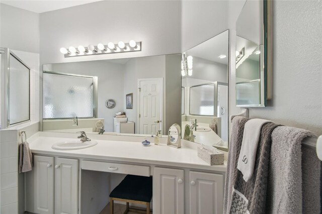 523 Shell Creek St, Poinciana, FL 34759 - bathroom featuring a shower stall and vanity