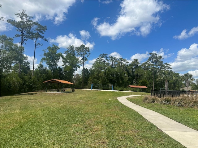 surrounding community featuring a gazebo and a yard