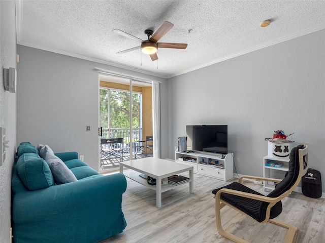 18001 Richmond Place Dr Unit 126, Tampa, FL 33647 - living area featuring a textured ceiling, a ceiling fan, crown molding, and light wood-style flooring