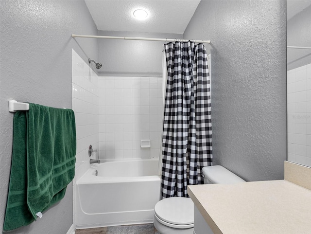 18001 Richmond Place Dr Unit 126, Tampa, FL 33647 - full bathroom with a textured wall, vanity, shower / bath combo, and a textured ceiling