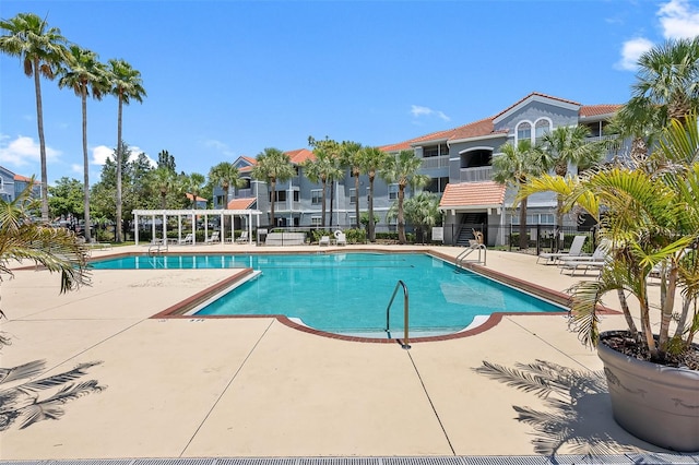 18001 Richmond Place Dr Unit 126, Tampa, FL 33647 - community pool with a patio area