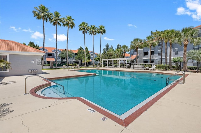 18001 Richmond Place Dr Unit 126, Tampa, FL 33647 - community pool featuring a residential view and a patio