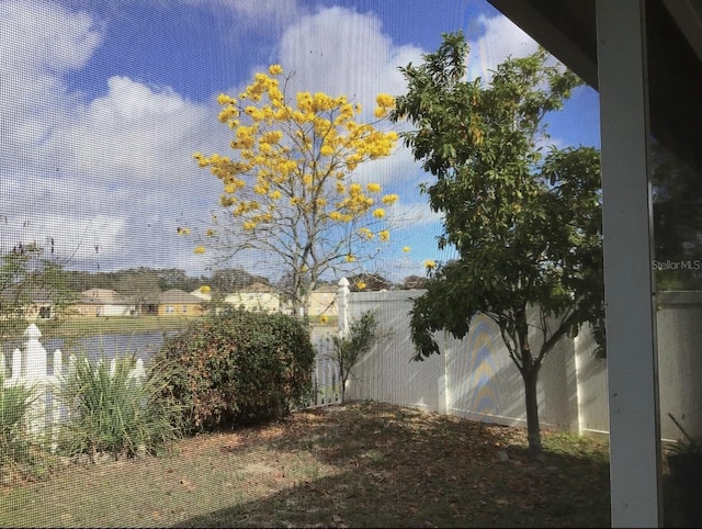 954 Hacienda Cir, Kissimmee, FL 34741 - water view with fence
