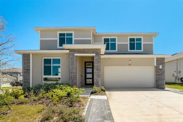 1003 Sugarwood St, Davenport, FL 33837 - prairie-style house featuring stucco siding, concrete driveway, and a garage