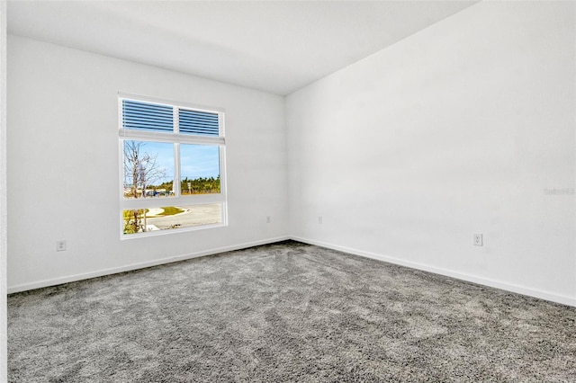 1003 Sugarwood St, Davenport, FL 33837 - carpeted spare room featuring baseboards