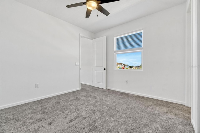 1003 Sugarwood St, Davenport, FL 33837 - carpeted spare room with baseboards and ceiling fan