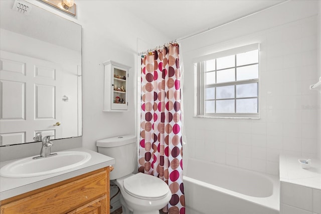 2289 Jessica Ln, Kissimmee, FL 34744 - full bath with shower / bath combo with shower curtain, toilet, vanity, and visible vents