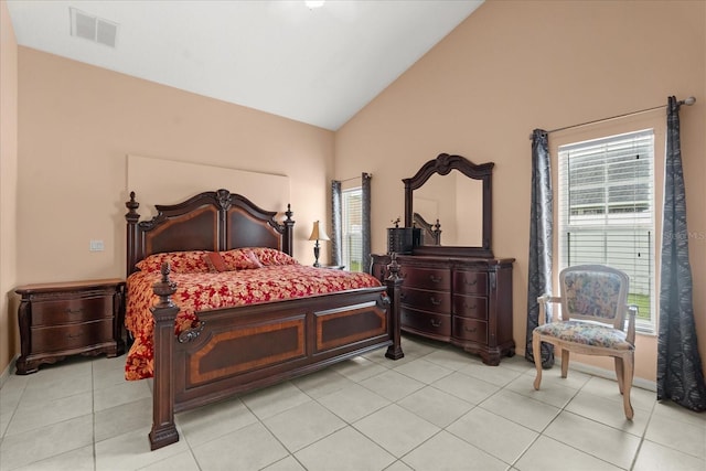 2289 Jessica Ln, Kissimmee, FL 34744 - bedroom with baseboards, visible vents, high vaulted ceiling, and light tile patterned floors