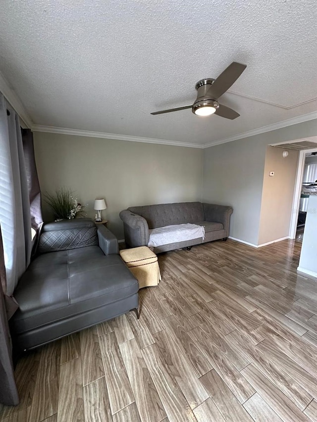 131 Water Front Way Unit 220, Altamonte Springs, FL 32701 - living room with ceiling fan, wood finished floors, ornamental molding, and a textured ceiling