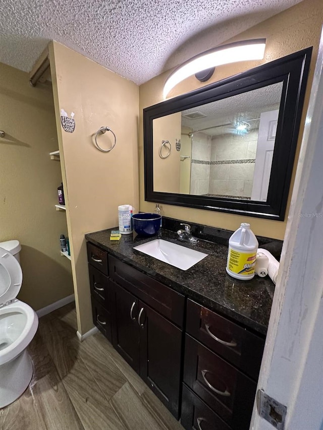 131 Water Front Way Unit 220, Altamonte Springs, FL 32701 - bathroom featuring a textured ceiling and vanity