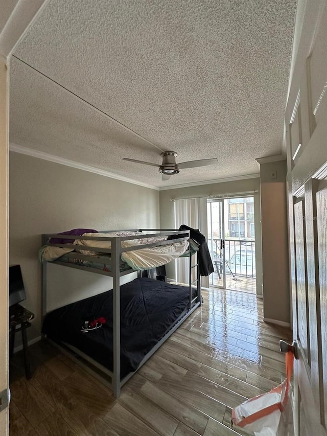 131 Water Front Way Unit 220, Altamonte Springs, FL 32701 - bedroom with crown molding, wood finished floors, a textured ceiling, and ceiling fan
