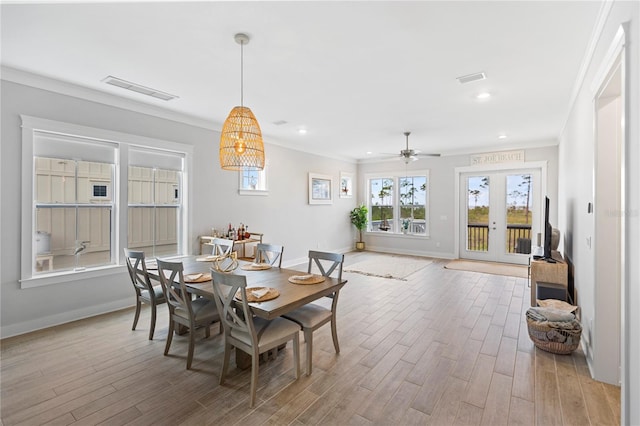 dining area with wood finished floors, baseboards, ornamental molding, a ceiling fan, and recessed lighting