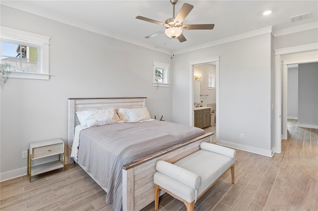 bedroom featuring light wood-type flooring, baseboards, ornamental molding, recessed lighting, and ensuite bathroom