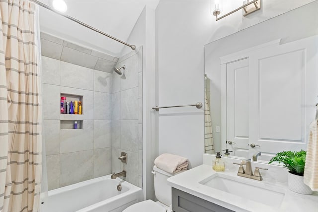 full bathroom with shower / bath combo with shower curtain, vanity, and toilet