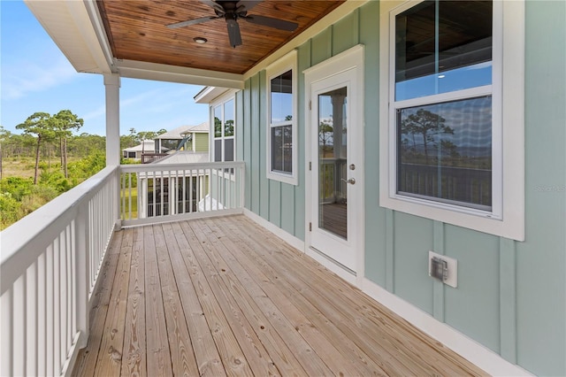 wooden terrace with ceiling fan