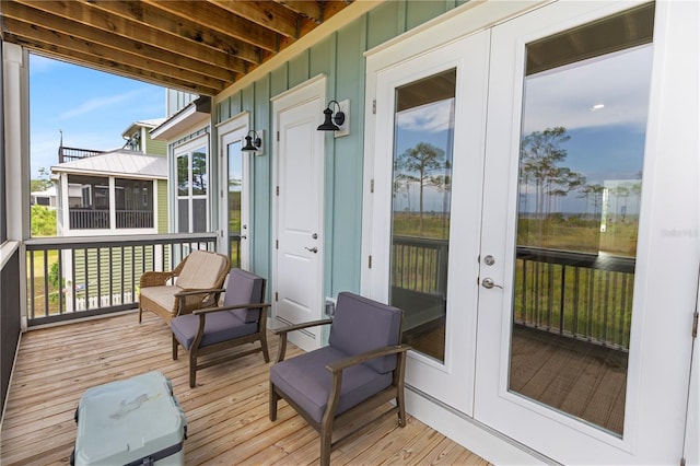 sunroom with french doors and healthy amount of natural light