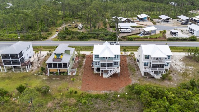 aerial view of residential area with a forest