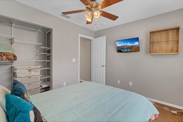 bedroom featuring ceiling fan, baseboards, visible vents, and carpet