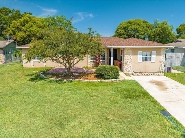 2430 Mill Run Blvd, Kissimmee, FL 34744 - view of front of house featuring stucco siding and stone siding
