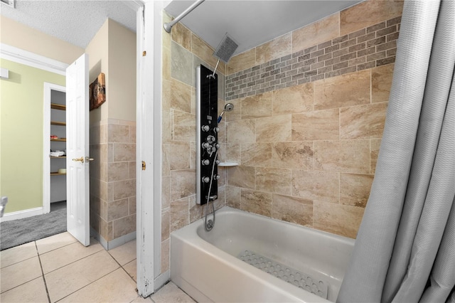 2430 Mill Run Blvd, Kissimmee, FL 34744 - bathroom with shower / tub combo and tile patterned flooring