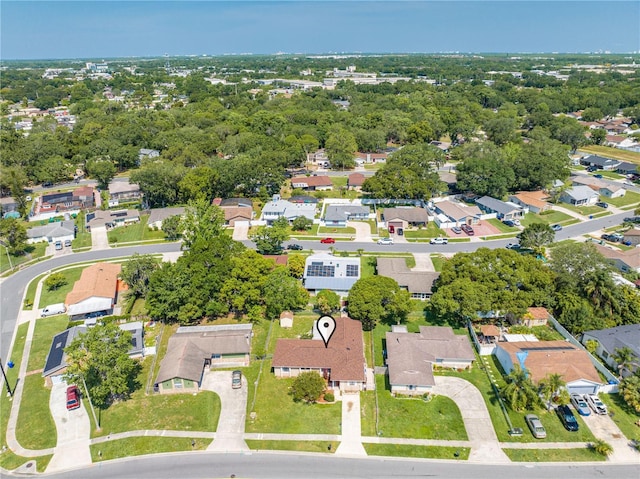 2430 Mill Run Blvd, Kissimmee, FL 34744 - aerial view of property's location featuring nearby suburban area and a tree filled landscape