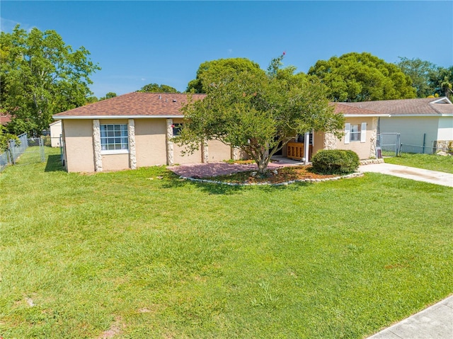 2430 Mill Run Blvd, Kissimmee, FL 34744 - view of front of house featuring stucco siding