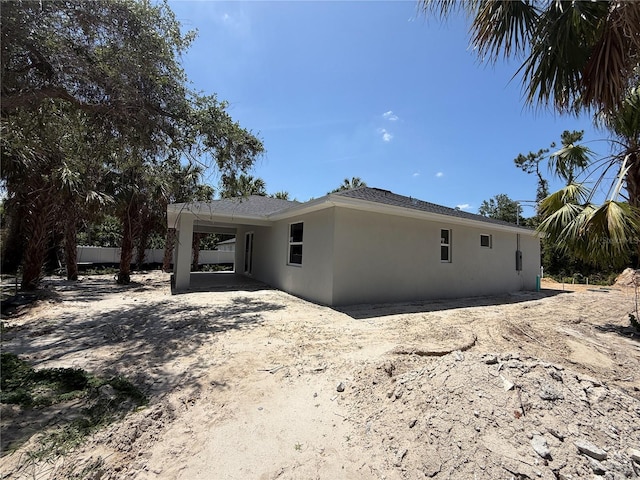 4098 New Milford St, North Port, FL 34288 - view of home's exterior with stucco siding