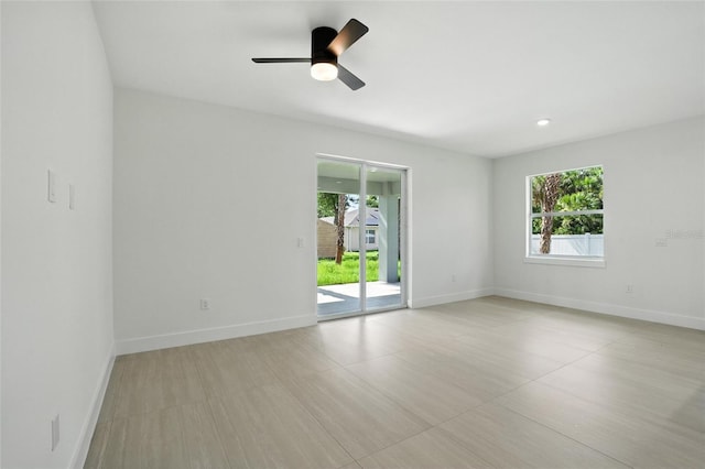 4098 New Milford St, North Port, FL 34288 - empty room with baseboards and a ceiling fan