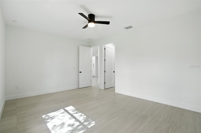 4098 New Milford St, North Port, FL 34288 - unfurnished room featuring ceiling fan and light wood finished floors