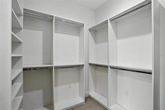 4098 New Milford St, North Port, FL 34288 - walk in closet with wood finished floors