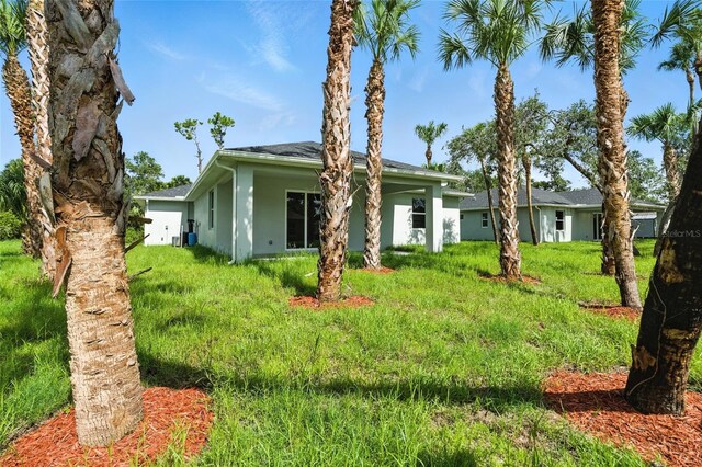 4098 New Milford St, North Port, FL 34288 - view of front of home featuring stucco siding