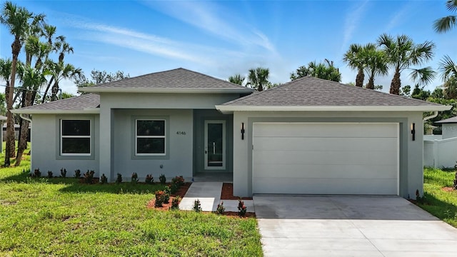 4098 New Milford St, North Port, FL 34288 - ranch-style house featuring stucco siding, an attached garage, a front yard, and roof with shingles