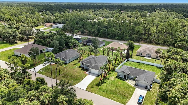 4098 New Milford St, North Port, FL 34288 - aerial perspective of suburban area featuring a heavily wooded area
