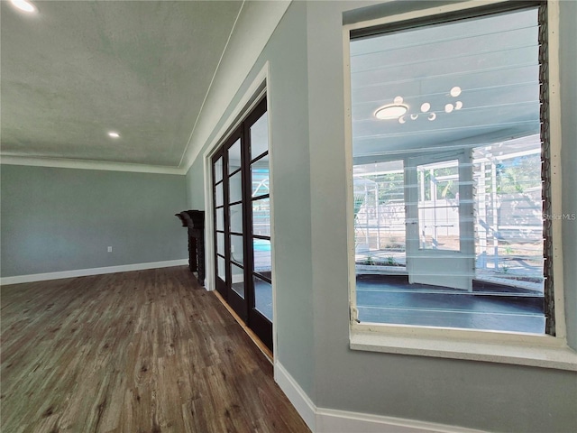 905 W 11th Ave, Mount Dora, FL 32757 - doorway to outside with ornamental molding, wood finished floors, baseboards, plenty of natural light, and recessed lighting