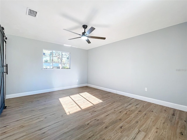905 W 11th Ave, Mount Dora, FL 32757 - unfurnished room featuring a ceiling fan, baseboards, and wood finished floors