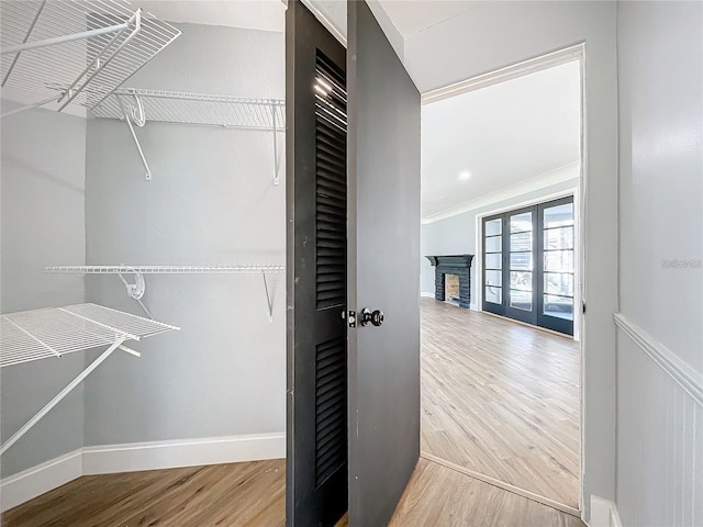905 W 11th Ave, Mount Dora, FL 32757 - spacious closet featuring wood finished floors and a fireplace